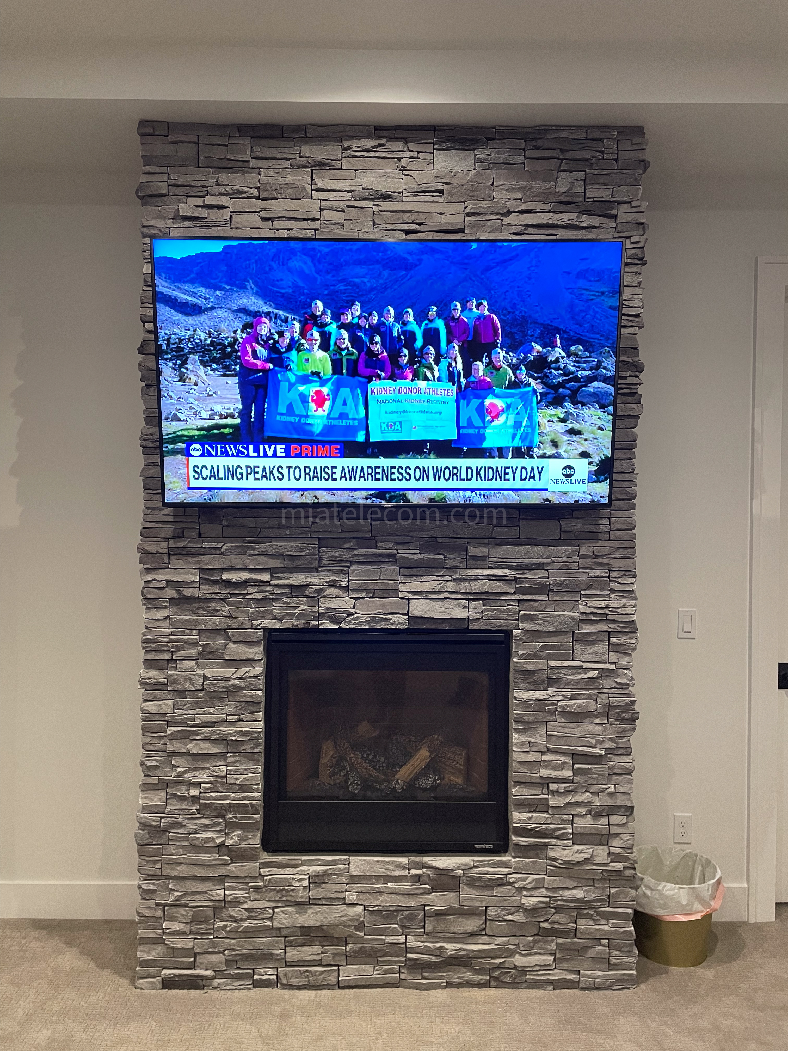 65'' On Brick Wall Over the fire Place Instalation with Audio